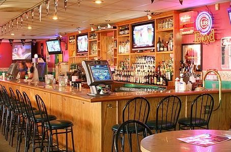 The long bar at Mowie's Cue
